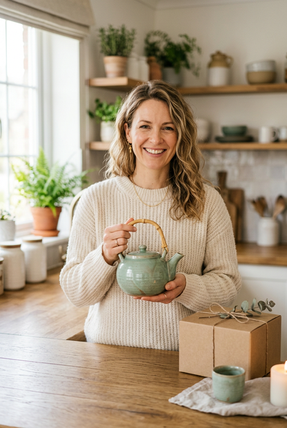 Model Holding Celadon Teapot - Shot 1